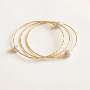 Floating Pearl Bangle Bracelets: Stylish and Versatile Accessories for Any Outfit 0240